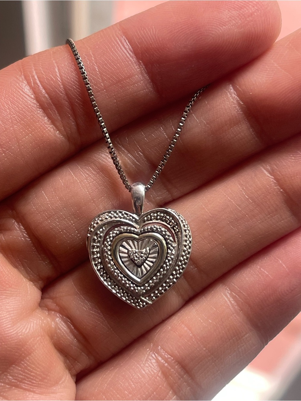 sterling Silver Heart Pendant (10k gold accent) with an 18 inch chain